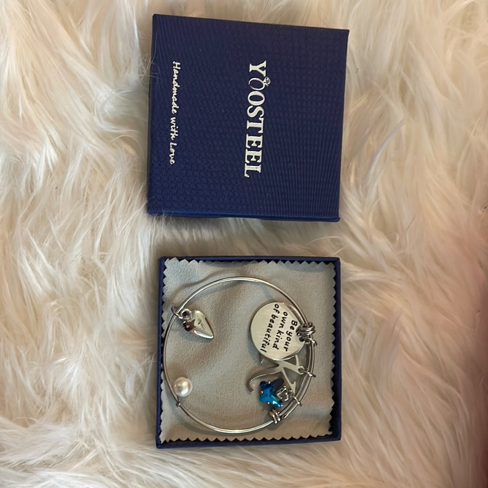 YOOSTEEL handmade bracelet with unique charms